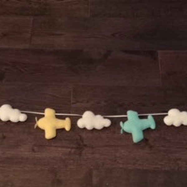 Handmade felt airplane and cloud garland