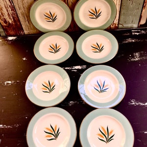 International D S Co Viking Bread Plates.  Set of 8.