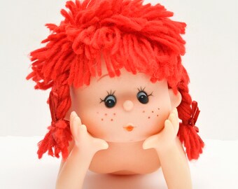 doll with red hair and freckles