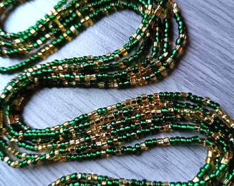 Cuentas de cintura verde esmeralda y doradas