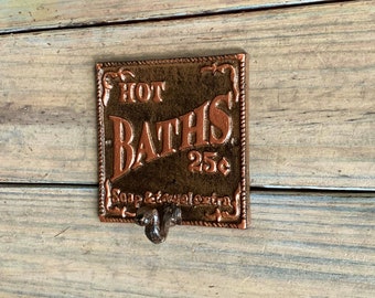 Rustic Cast Iron Bathroom Wall Hook, "Hot Baths" Sign