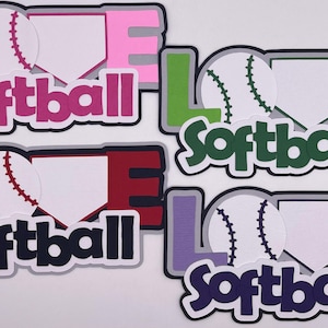 May include: Four colorful paper cutouts of the word "LOVE" with a baseball and a heart shape. The word "Softball" is written below each cutout.