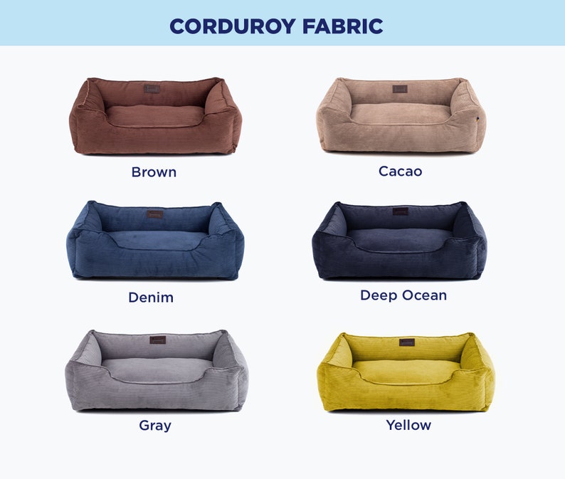 May include: Six dog beds in different colors, including brown, cacao, denim, deep ocean, gray, and yellow. The beds are made of corduroy fabric and have a rectangular shape with a raised edge.
