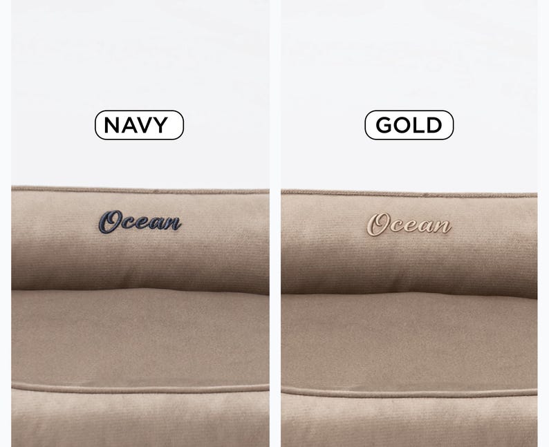 May include: Two close-up images of a pet bed. The left image shows a navy blue embroidered "Ocean" logo, with the word "NAVY" above it. The right image shows a gold embroidered "Ocean" logo, with the word "GOLD" above it. The bed is a neutral beige color.