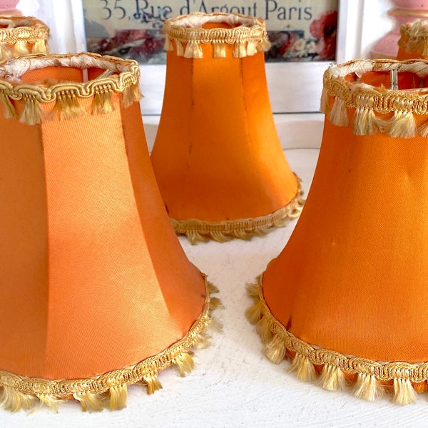 Vintage 1950s French Parisian Chic Petite Lamp Shades. Lovely Orange Apricot Satin with Light Golden Tassel Trim. Clip on. Sold pr Shade