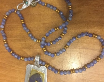 Blue Denim Lapis and Brass Beaded Necklace with an Afganistan Lapis, Brass, and Sterling Silver Pendant