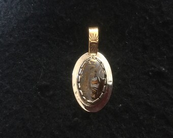 An Australian Boulder Opal Pendant set in Sterling Silver