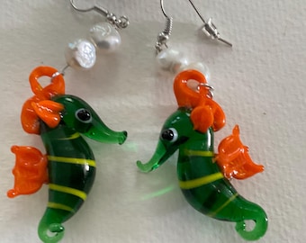Sea horses ,glass hand made,sterling silver ear wires.