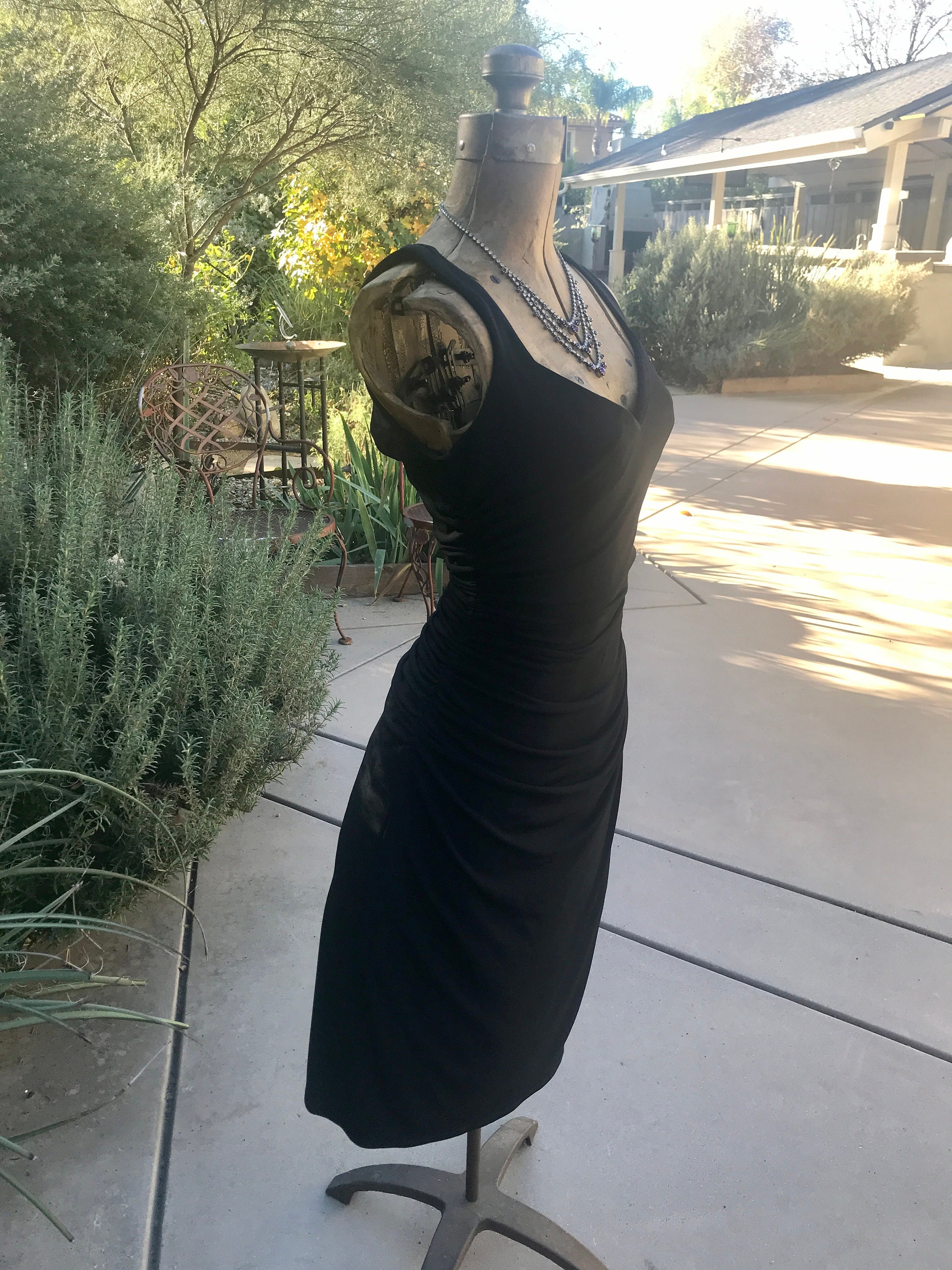 laundry by shelli segal leather dress Laundry by Shelli Segal created some of the most quintessential 90s dresses. The perfect square neck, mini length black dress by Laundry is now online