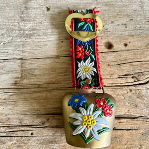 Swiss Grindelwald / Wall Hanging / Hand Painted Bell / Edelweiss Flower / Blue Flower / Red Flower / Brass Bell / Gold Heart / Floral Fabric