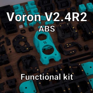May include: A collection of 3D printed Voron V2.4R2 ABS functional kit parts in black and teal. The components feature integrated brass inserts and various geometric shapes, including a central teal housing piece with a Voron logo cutout.