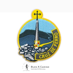 May include: A yellow and blue embroidered patch with a cross on top of a tower, surrounded by a yellow circle with the text "Cruz de Ferro" in black and white.