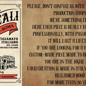May include: A vintage-style sign with the text "Doreali Studio Roma" and Italian text. The sign features illustrations of the Colosseum and a wolf with two babies. The text on the sign says the products are handcrafted in Italy.