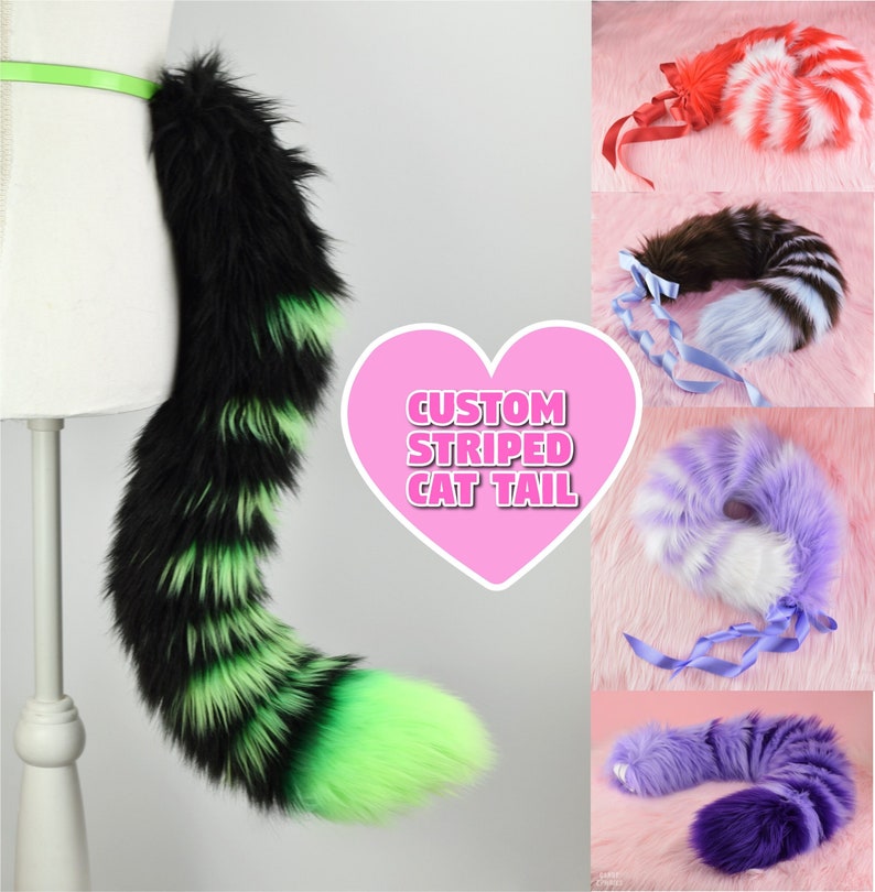 May include: A variety of custom striped cat tails in different colors, including black and green, red and white, brown and blue, purple and white, and purple. The tails are made of fluffy fur and have a striped pattern. The text "CUSTOM STRIPED CAT TAIL" is displayed in a pink heart shape.