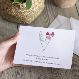 Matrimonio di fiori di nascita della coppia Salva le carte della data
