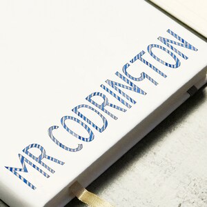 Cuaderno personalizado de la carta a rayas del profesor