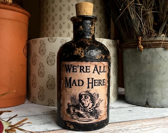Alice in Wonderland. We're All Mad Here. Alice in Wonderland Party. Mad Here Bottle. Mad Hatters. Alice in Wonderland Decor.