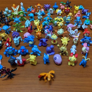 Pokemon Mini Figures 24 per Pack, 8 Different Packs
