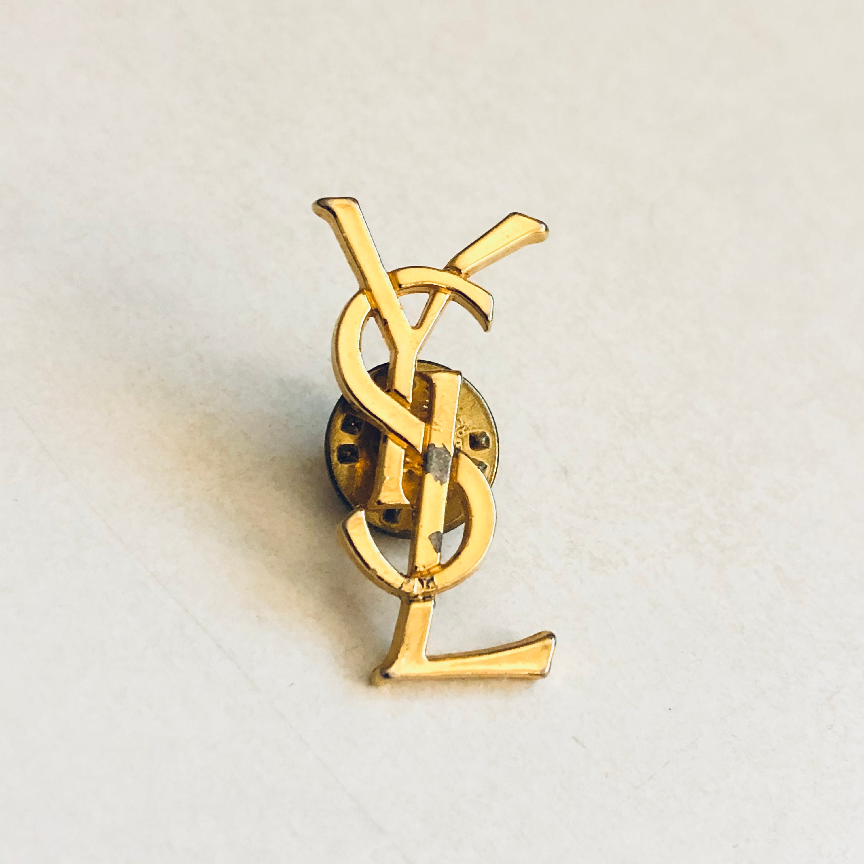 ysl badge