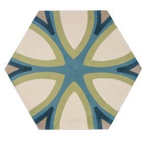 May include: A hexagonal ceramic tile with a geometric pattern in shades of blue, green, and beige. The design features a central cross shape with four curved petals.