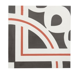May include: Black and white geometric tile with red lines. The tile has a repeating pattern of circles and squares.