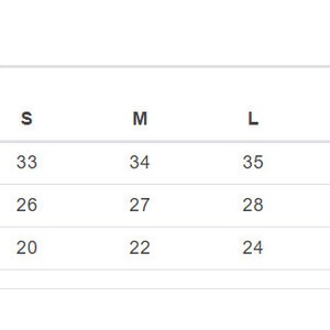 May include: A size chart showing measurements in inches for a garment. The chart includes measurements for sleeve length, full body length, and body width. Sizes range from S to 2XL.
