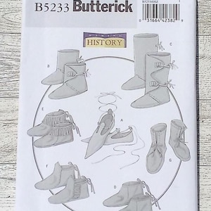 May include: A Butterick sewing pattern, B5233, featuring illustrations of various historical footwear designs. The pattern includes boots, shoes, and ankle boots. The text "MAKING HISTORY" is also visible.
