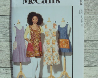 McCalls Easy Sewing Pattern 8308 Misses Aprons in 4 Styles Criss Cross Apron with Pockets Sizes S to XL