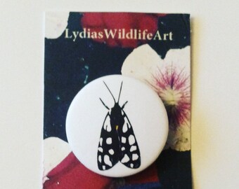 A Moth Badge, or Moth Pin, this fashion accessory, is a small light , easy to wear insect art piece.