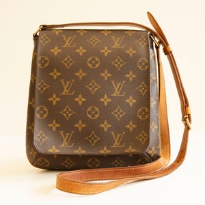 Brown Louis Vuitton Monogram Musette Salsa Long Strap Crossbody Bag, Supreme x Louis Vuitton x Adidas NMD R1 sneakers_and_bonsai