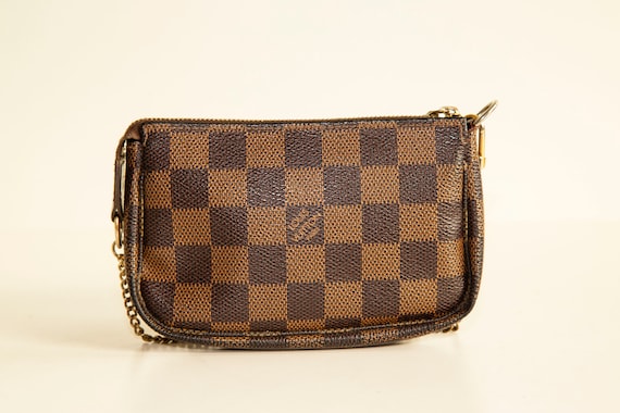 Authenticated Used Rare limited edition Louis Vuitton LOUIS