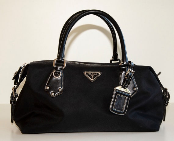 Prada black leather handbag with detachable nylon branded strap, gunmetal  tone hardware, black jacquard branded lining | Russell Kaplan Auctioneers