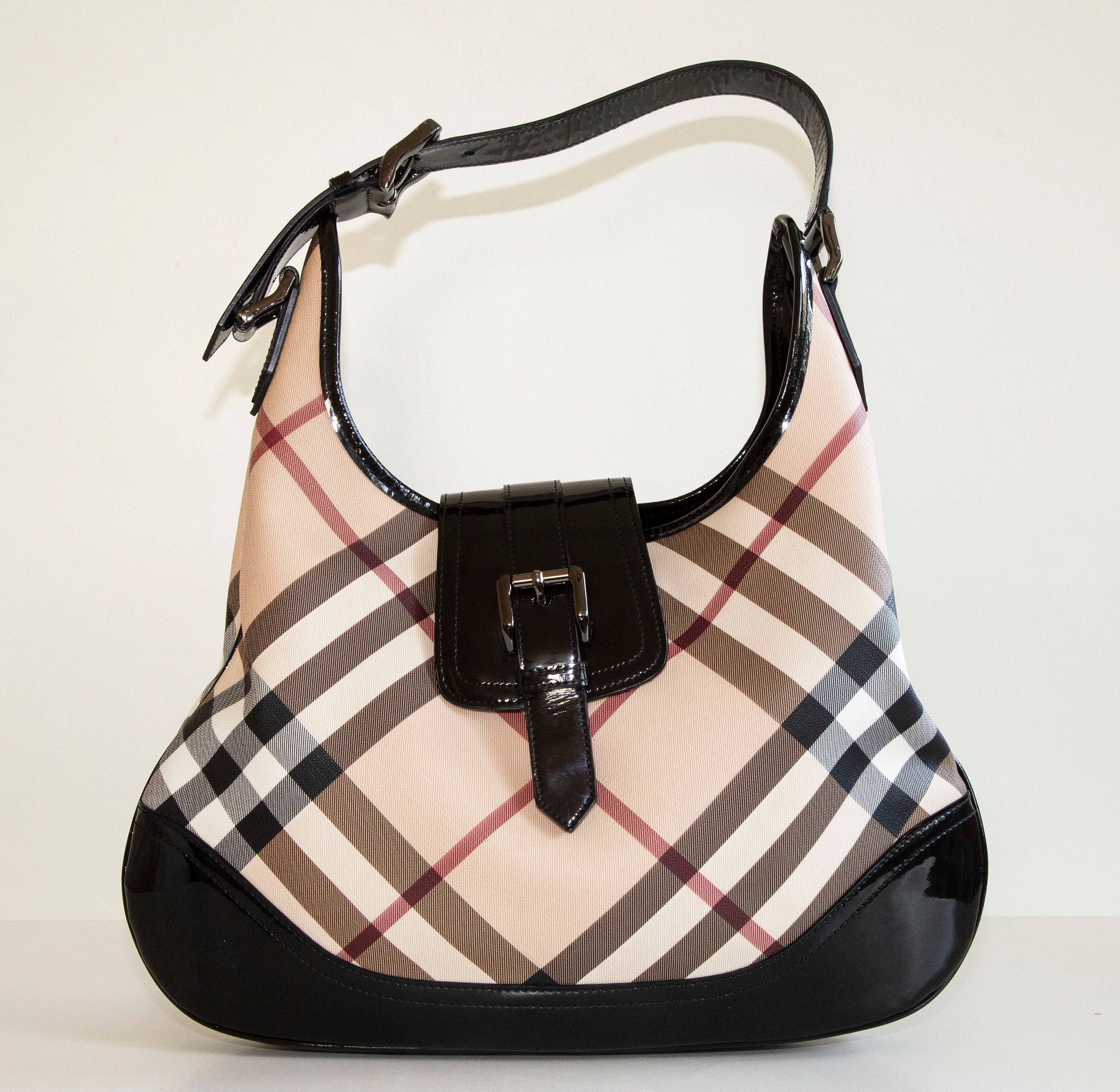 This chic hobo is crafted of classic Burberry Nova check canvas.
