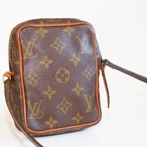 Sold at Auction: Louis Vuitton, Louis Vuitton Monogram Mini Danube Cross  Body Bag