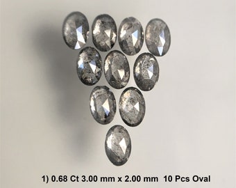 Pode incluir: Dez diamantes cinzentos soltos de forma oval. Os diamantes medem aproximadamente 3,00 mm x 2,00 mm e pesam um total de 0,68 quilates. 1) 0.68 Ct 3.00 mm x 2.00 mm 10 Pcs Oval