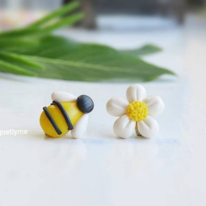 Little Bee & Daisy Stud Earrings. Mismatched Earrings. Handmade Polymer Clay Jewellery. Beautiful gift for gardeners