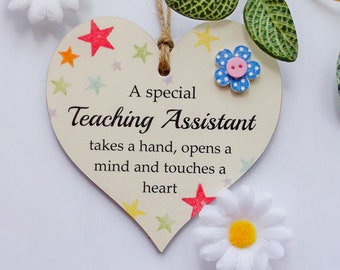 A Special Teaching Assistant Takes A Hand Wooden Gift Heart