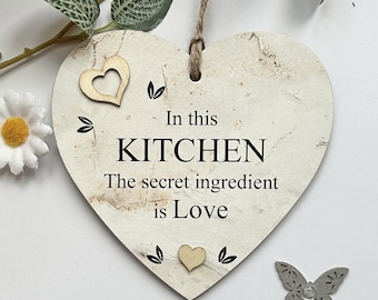 In This Kitchen The Secret Ingredient Door plaque
