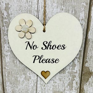 Corazón de madera sin zapatos / Alfombra nueva para casa