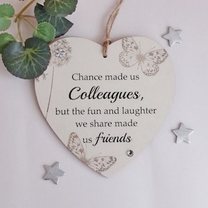 Chance made us colleagues, but the fun and laughter  we share made us friends Wooden heart Plaque
