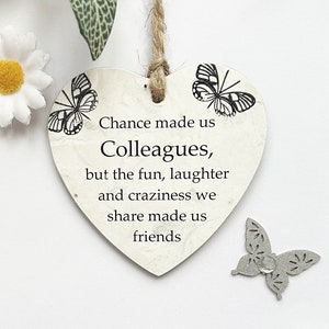 Cute Chance made us colleagues, but the fun and laughterand craziness  we share made us friends Wooden heart Plaque/Sign