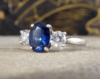 Oval Cut 1.75ct Sapphire and Diamond Three Stone Ring in Platinum