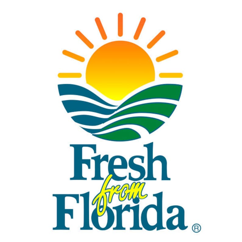 May include: A logo with a stylized sun rising over a green hill and blue waves. The text below reads "Fresh from Florida" with a registered trademark symbol.