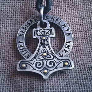 Thor&#39;s hammer. Vikings Necklace Silver round pendant with runic signs and a riveted silver Thor hammer. Round Runes Pendant