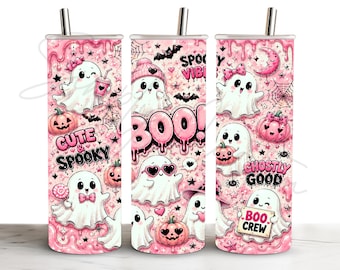May include: Three cylindrical tumblers with metal straws featuring a pink Halloween pattern with ghosts, pumpkins, bats, and spiderwebs. Text includes CUTE & SPOOKY, SPOOKY VIBES, BOO!, GHOSTLY GOOD, and BOO CREW. The design has a dripping liquid effect.