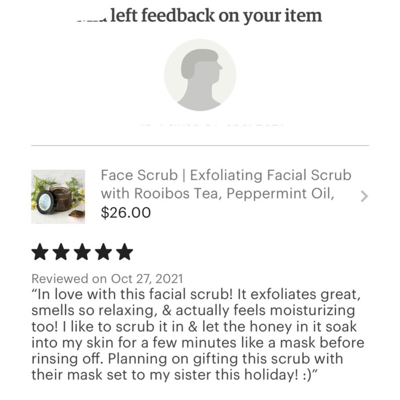 May include: A five-star review for a face scrub with rooibos tea and peppermint oil. The product is in a glass jar with a brown lid and is priced at $26.00. The review states that the scrub exfoliates well, smells relaxing, and feels moisturizing. The reviewer plans to gift the scrub to their sister.