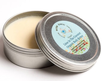 May include: A silver tin container with a white label that reads "Lime In The Coconut Organic Body Butter". The label has a cartoon ballerina and a list of ingredients including sweet almond oil, shea butter, extra virgin coconut oil, vitamin E oil, coconut extract, and lime oil.
