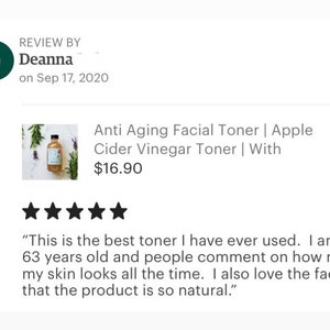 May include: A five-star review for an anti-aging facial toner with apple cider vinegar. The product is pictured in a clear glass bottle with a white label. The review states "This is the best toner I have ever used. I am 63 years old and people comment on how nice my skin looks all the time. I also love the fact that the product is so natural."