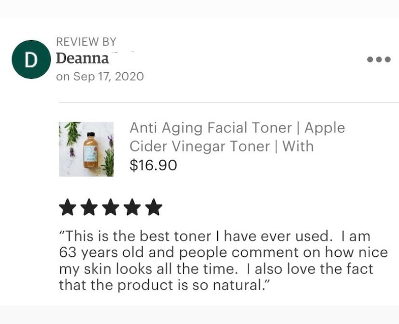 May include: A five-star review for an anti-aging facial toner with apple cider vinegar. The product is pictured in a clear glass bottle with a white label. The review states "This is the best toner I have ever used. I am 63 years old and people comment on how nice my skin looks all the time. I also love the fact that the product is so natural."