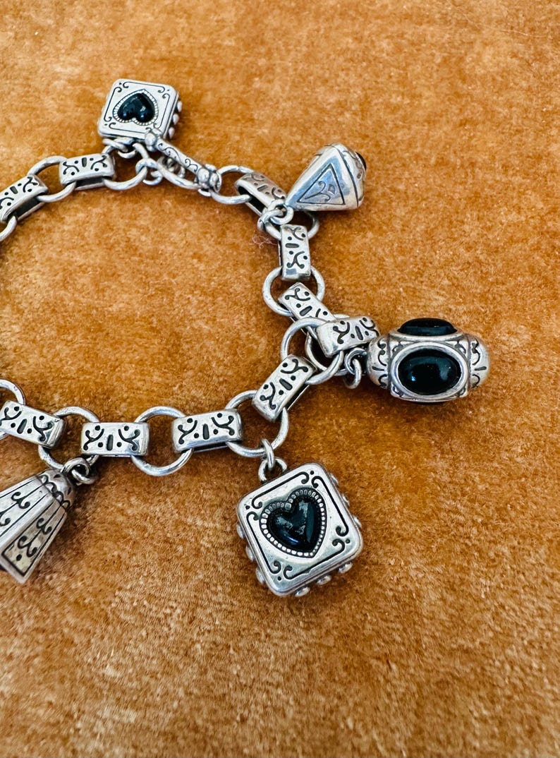 May include: A rustic wooden sign with the text "Welcome to our home" in white lettering. The sign features a distressed finish and a simple, inviting design, perfect for entryway decor.